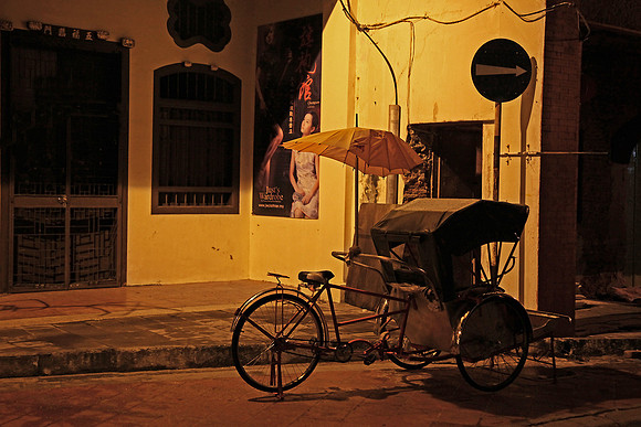 Trishaw park by the road side in Georgetown